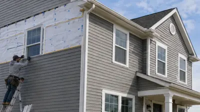Professional siding installation in Rhode Island with weather barrier protection, precision trim work, and premium vinyl siding designed to withstand coastal weather and New England freeze-thaw cycles.