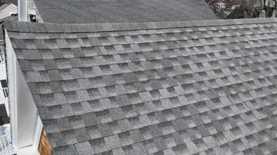 Drone view of an asphalt shingle roof on a coastal home in Bristol, Rhode Island.