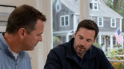 Rhode Island homeowner reviewing roof replacement financing options for a premium roof system in 2026.