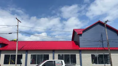 Standing seam metal roof on a Rhode Island home with concealed fasteners.