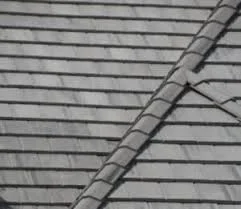 Completed luxury roof replacement with new tile and updated gutters on a Greenwood Village, CO estate