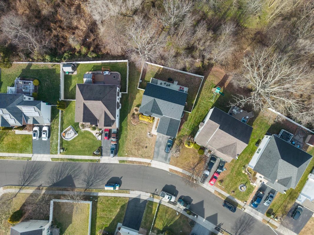 Aerial view of Washington Township homes in Bergen County, NJ, highlighting residential roofing systems and roof replacement projects.