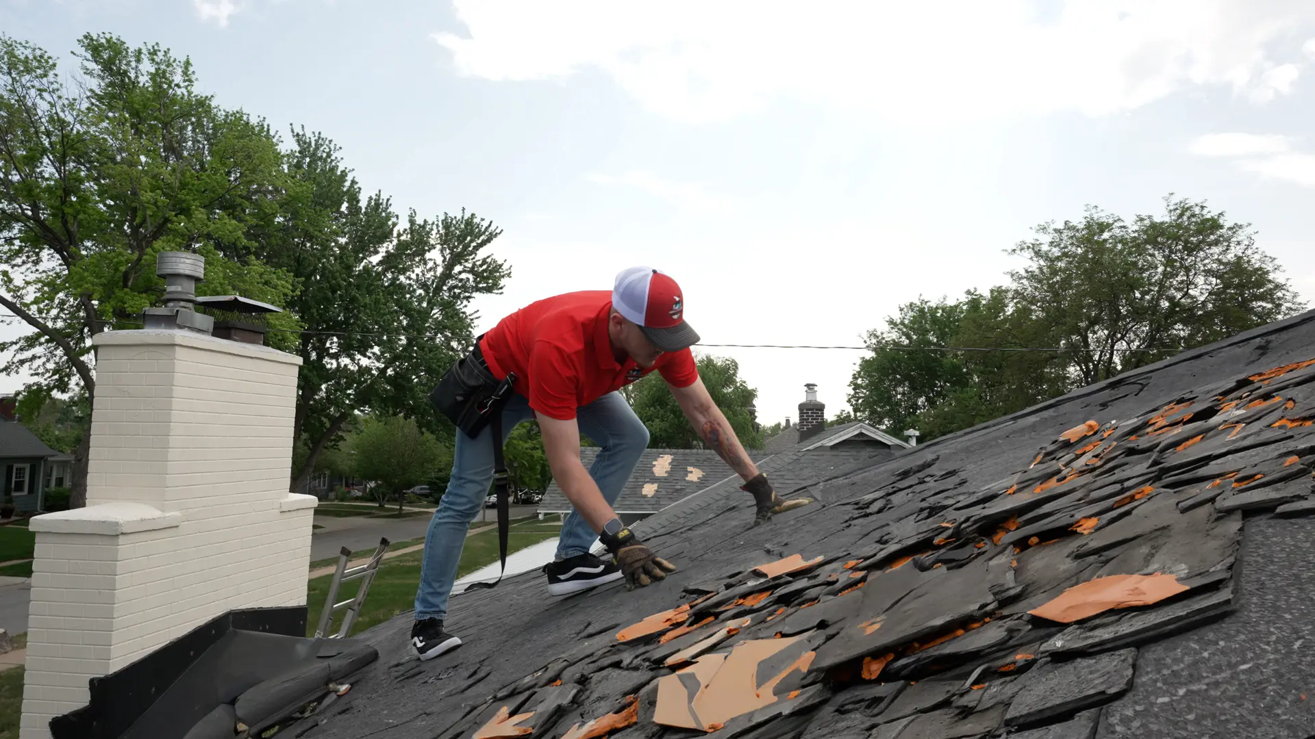 Mighty Dog Roofing rep inspecting roof damages after jersey storm