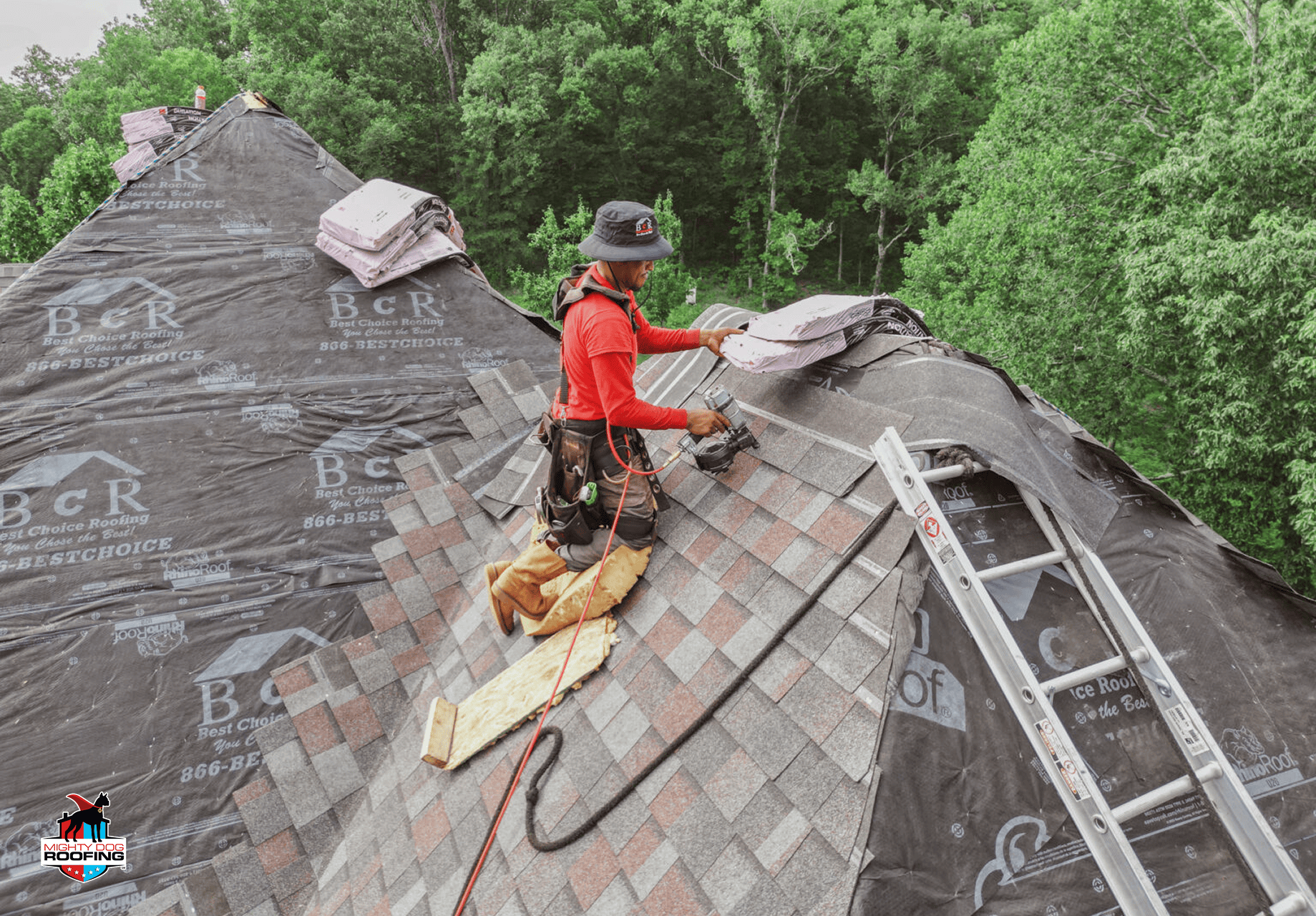 Licensed roofing contractor performing full roof replacement project