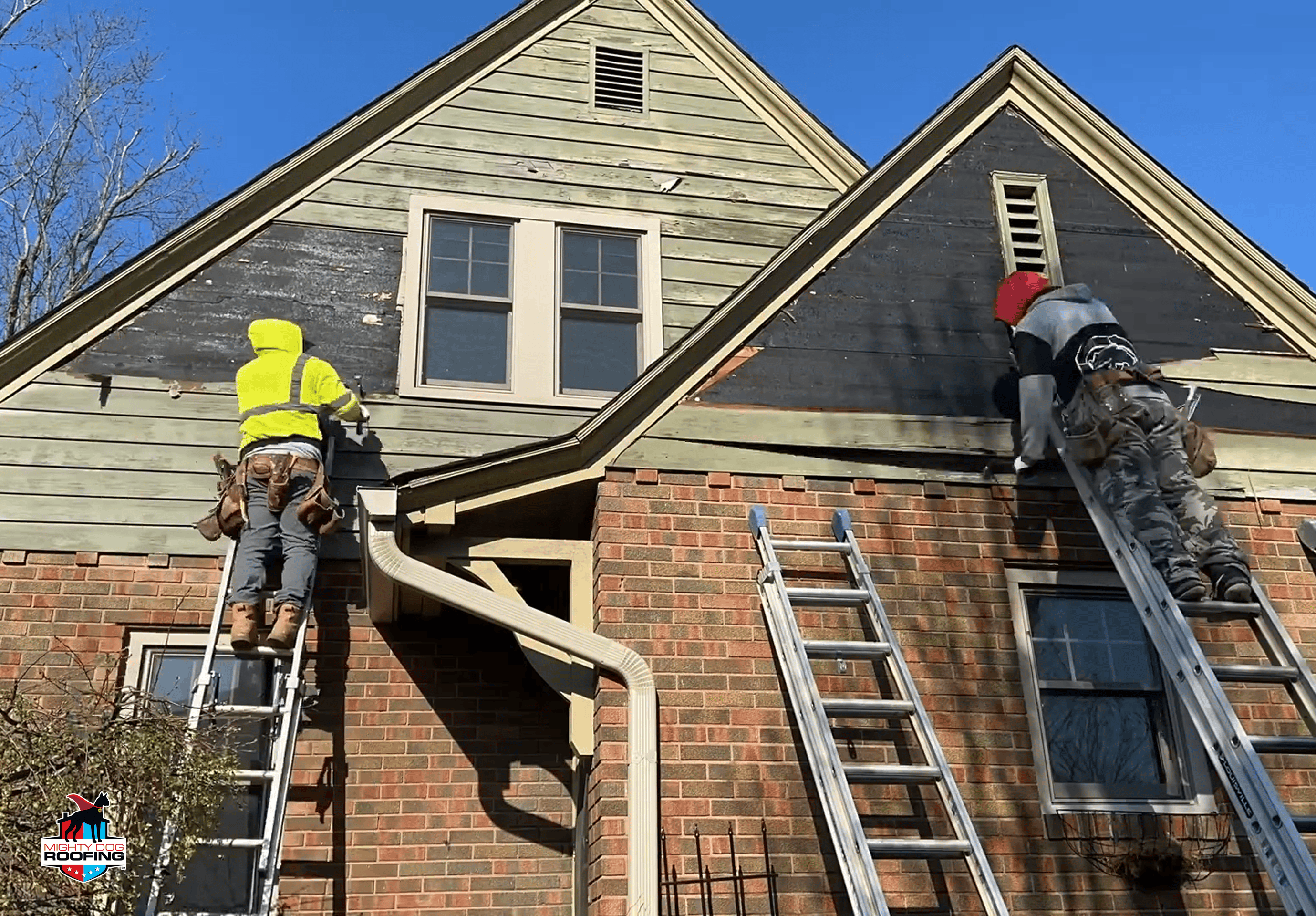 Licensed siding contractor performing insulated siding installation