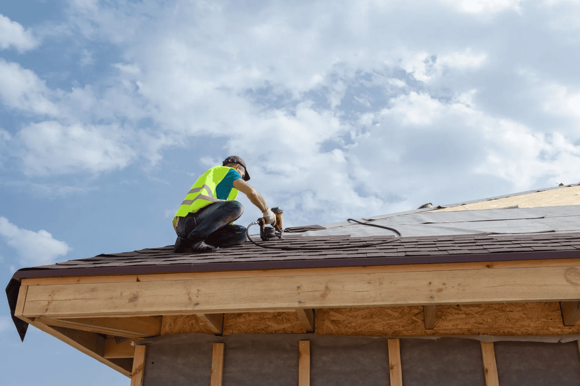 roof replacement contractor installing new shingles